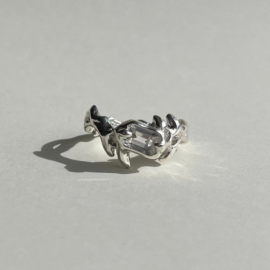 Mini KHAOS sterling silver ring with emerald cut white topaz gemstone