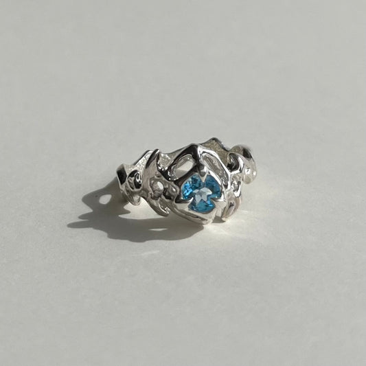 Mini KHAOS sterling silver ring with round cut Swiss blue topaz gemstone