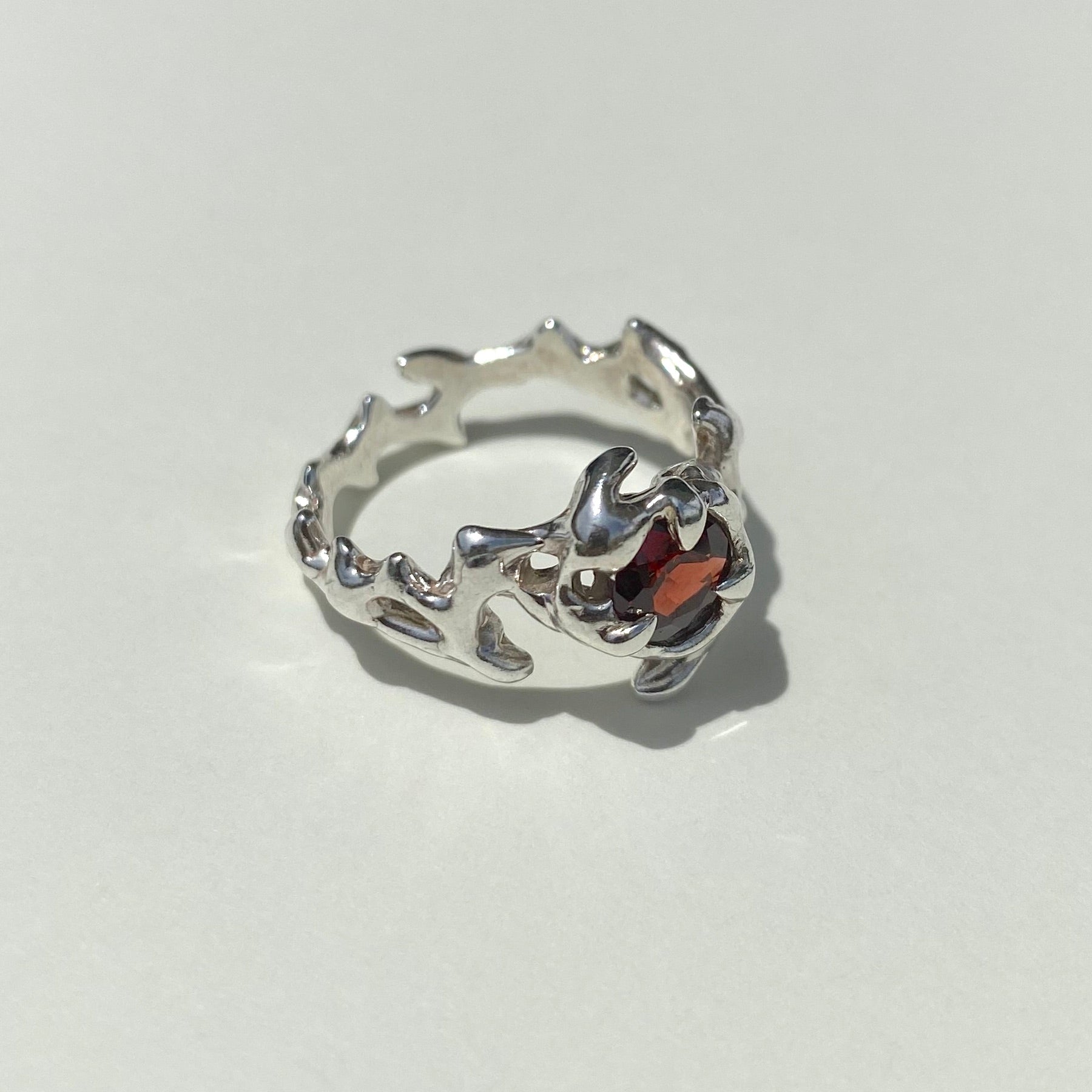Mini KHAOS sterling silver and Garnet ring X