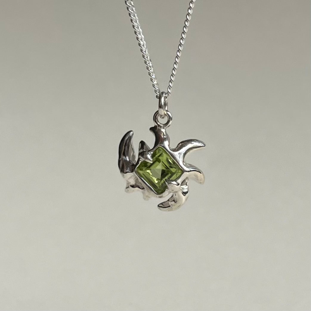 Mini KHAOS sterling silver necklace with square cut peridot gemstone