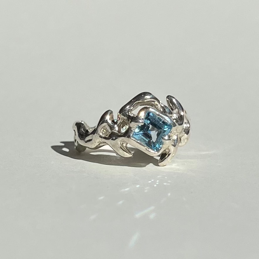 Mini KHAOS sterling silver ring with square cut Swiss blue topaz gemstone