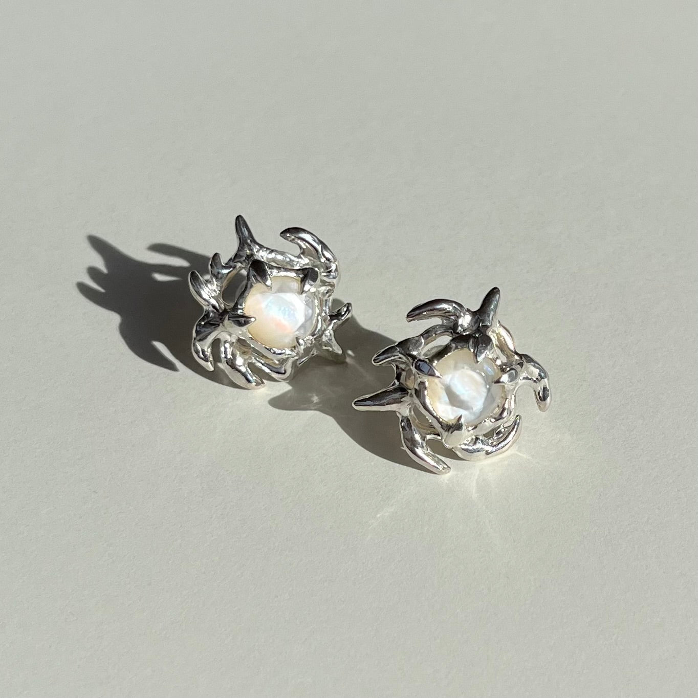KHAOS sterling silver and Mother of pearl earrings